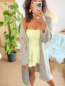 Gilet long en maille ajourée brillant beige